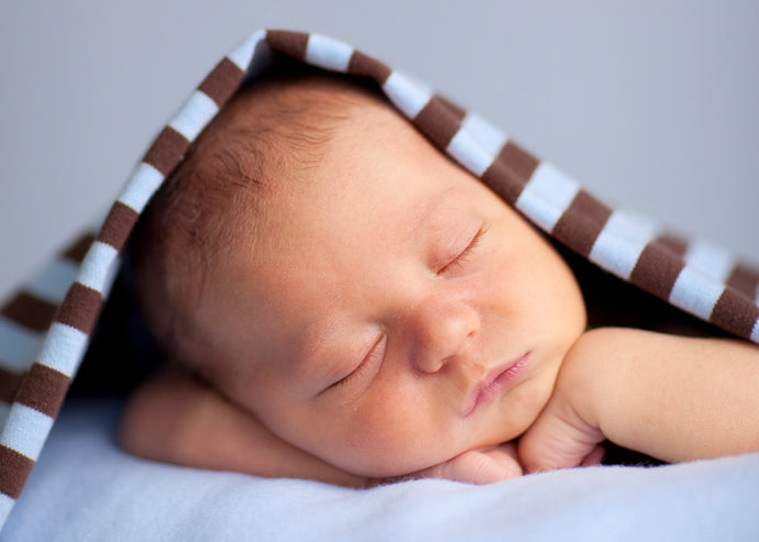 When do babies start sleeping through the night?